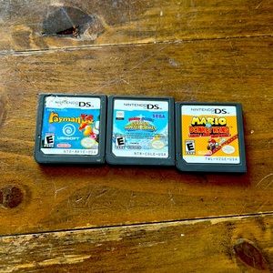 Ds games bundle 2 mario gmes and 1 raymen